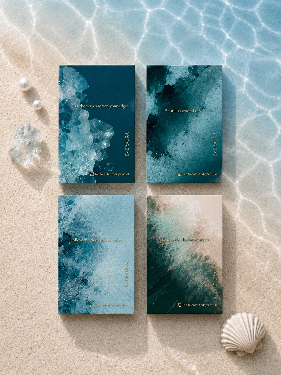 EverAura Ocean Healing Ritual Card Set, the four card designs laid on sand beneath clear shallow water with shells and pearls. Follow the tide back to calm, Be still as coastal rock, Stay with the rhythm of water, and Let the waves soften your edges.