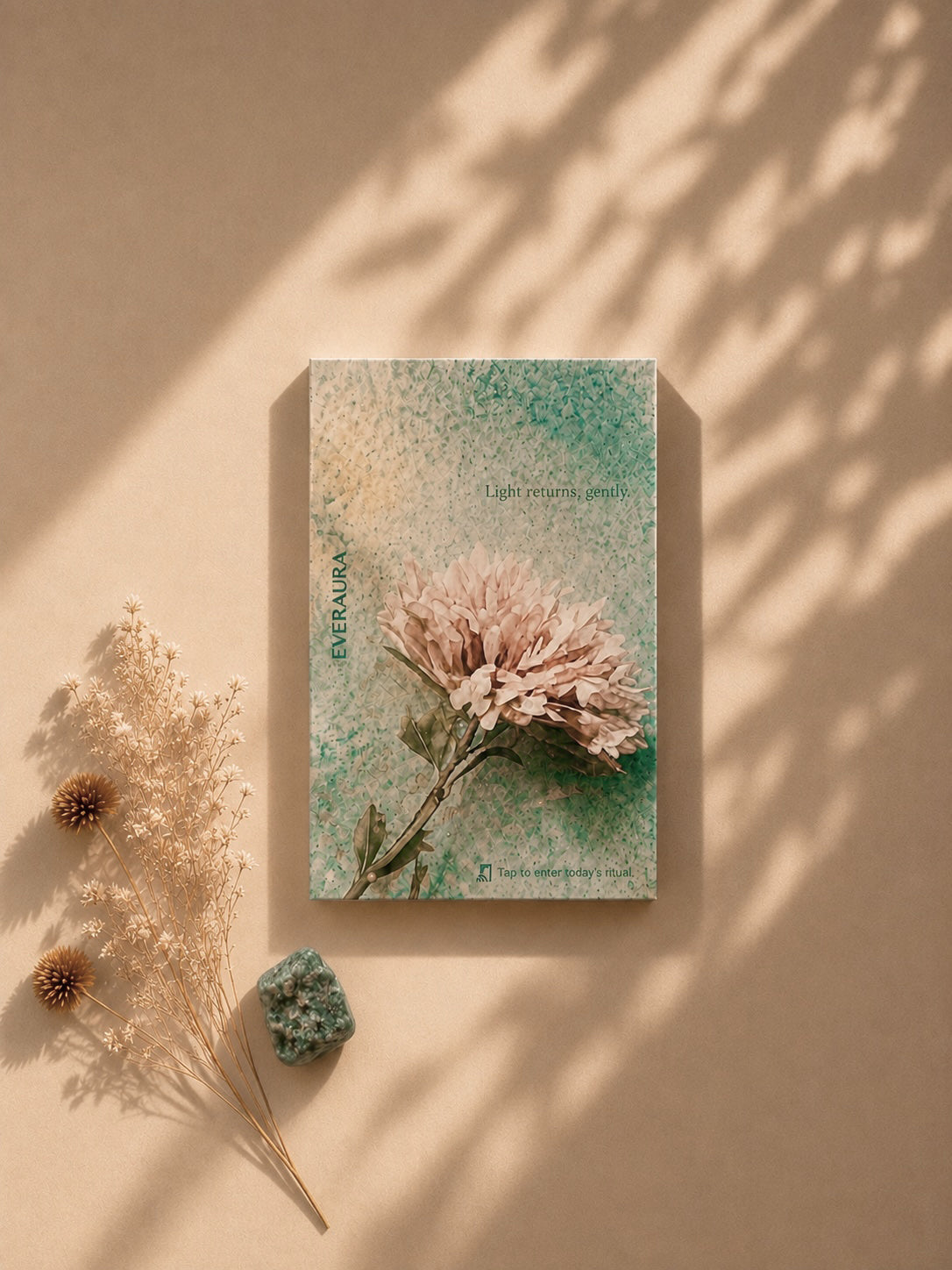 EverAura Radiant Heart ritual card, Light returns gently, a chrysanthemum design styled with dried flowers and a green stone. A daily nature meditation and scent card.