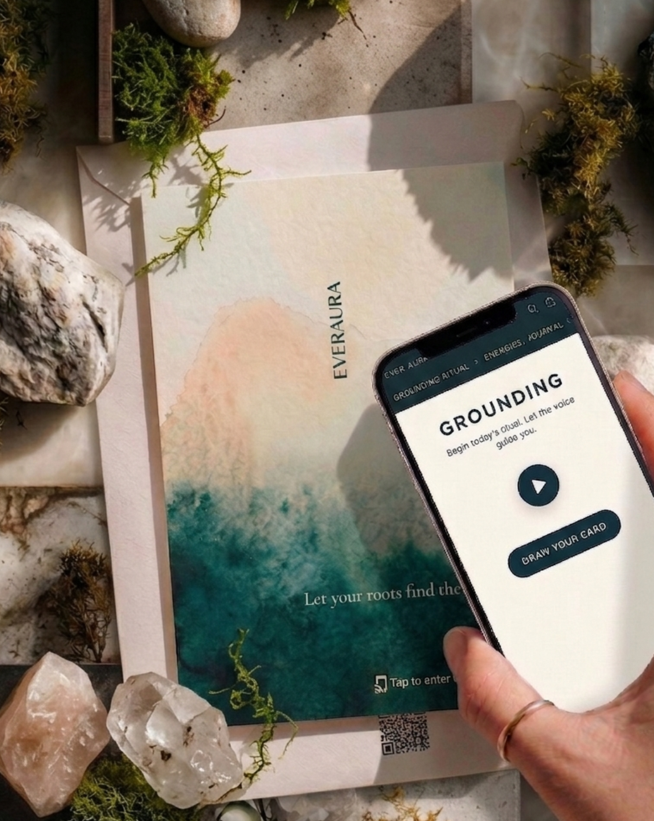 EverAura Grounding Scent Card with embedded NFC — the scent of sage and earth. Tap to enter the Grounding Daily Ritual: a guided meditation, a nature soundscape, and a daily energy card draw.