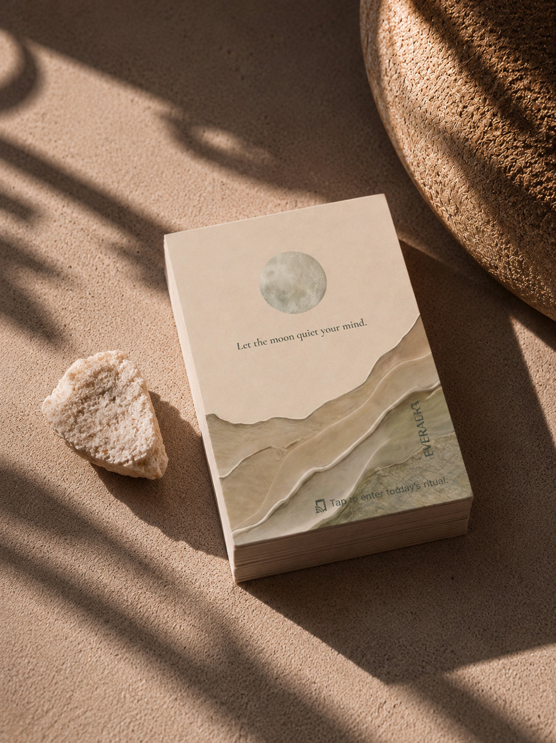 EverAura Moon Water ritual card from the Four Energies Set, Let the moon quiet your mind, styled with a raw white stone. A one minute nature meditation and scent card.