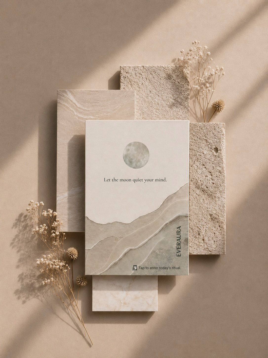 EverAura Moon Water ritual card, Let the moon quiet your mind, styled on stone tiles with dried baby's breath. A one minute evening nature meditation and scent card.