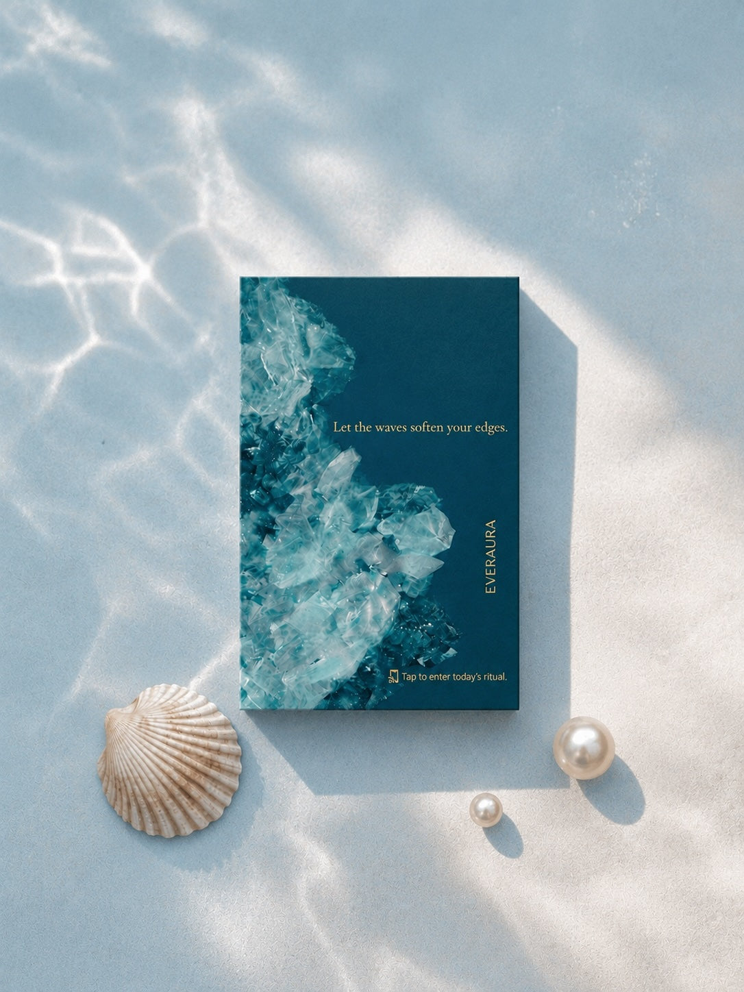 EverAura Ocean Healing ritual card, Let the waves soften your edges, styled on sand under gentle water with a shell and pearls. A one minute nature meditation and scent card.